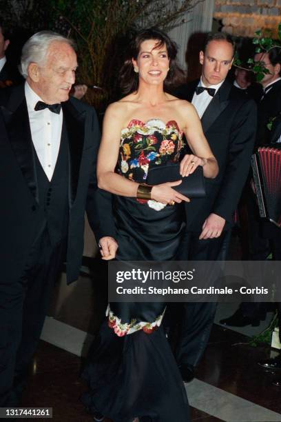 Prince Rainier III of Monaco, Princess Caroline of Monaco and Prince Albert II of Monaco attend the 33th Rose Ball on March 12, 1994 in Monaco,...