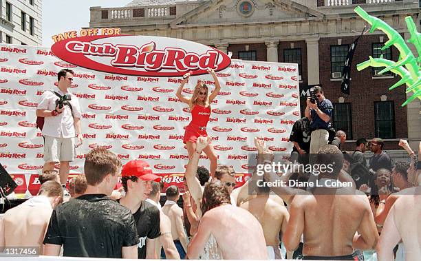 Carmen Electra, Baywatch actress and star of "Scary Movie," parties with Big Red Gum in the world''s largest hot tub June 12, 2001 to announce 30...