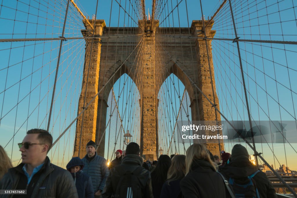 Tourist Pedestrians Crowd Walk On Brooklyn Bridge Manhattan New York ...