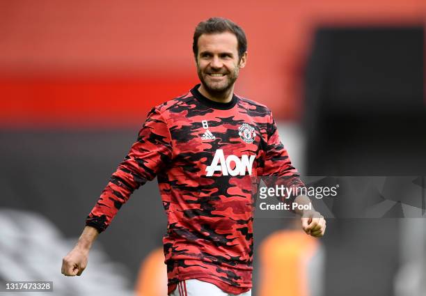 Juan Mata of Manchester United reacts during the warm up prior to the Premier League match between Manchester United and Leicester City at Old...