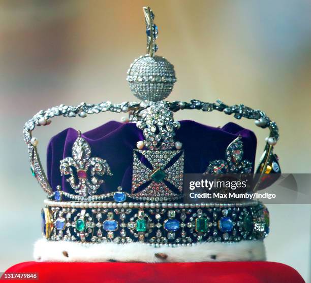 The Imperial State Crown is driven down The Mall, in a Rolls Royce Phantom VI, en route to the Houses of Parliament where Queen Elizabeth II is to...