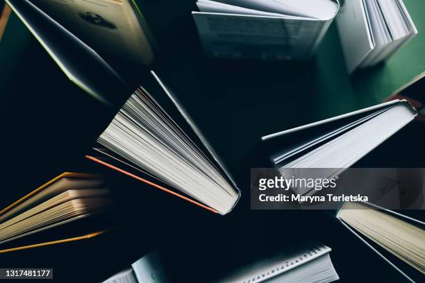 background with many books. - academic book cover ストックフォトと画像