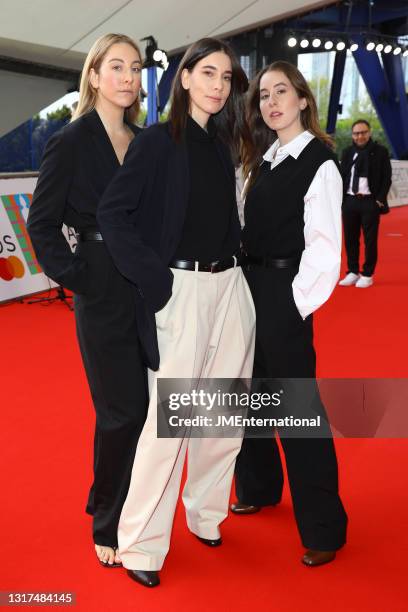 Este Haim, Danielle Haim,and Alana Haim of Haim attend The BRIT Awards 2021 at The O2 Arena on May 11, 2021 in London, England.