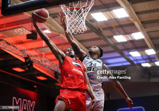 William Lee of Leicester Riders is stopped by Justin Gordon of Newcastle Falcons during the BBL Play-Off Semi-Final match between Leicester Riders...