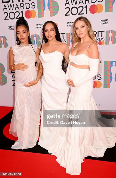 Jade Thirlwall, Perrie Edwards and Leigh-Anne Pinnock of Little Mix attend The BRIT Awards 2021 at The O2 Arena on May 11, 2021 in London, England.