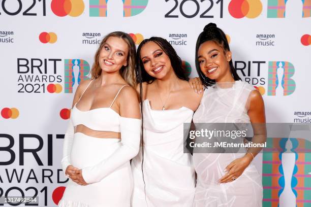 Perrie Edwards, Jade Thirlwall and Leigh-Anne Pinnock of Little Mix pose in the media room during The BRIT Awards 2021 at The O2 Arena on May 11,...