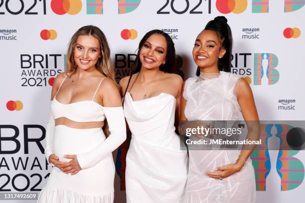 Perrie Edwards, Jade Thirlwall and Leigh-Anne Pinnock of Little Mix pose in the media room during The BRIT Awards 2021 at The O2 Arena on May 11,...