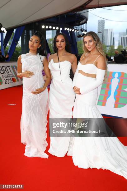 Leigh-Anne Pinnock, Jade Thirlwall and Perrie Edwards of Little Mix arrive at The BRIT Awards 2021 at The O2 Arena on May 11, 2021 in London, England.