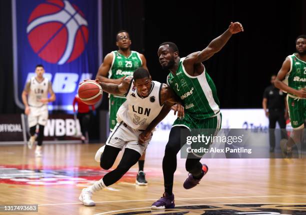 Deandre Liggins of London Lions takes on Ashley Hamilton of Plymouth Raiders during the BBL Play-Off Semi-Final match between London Lions and...