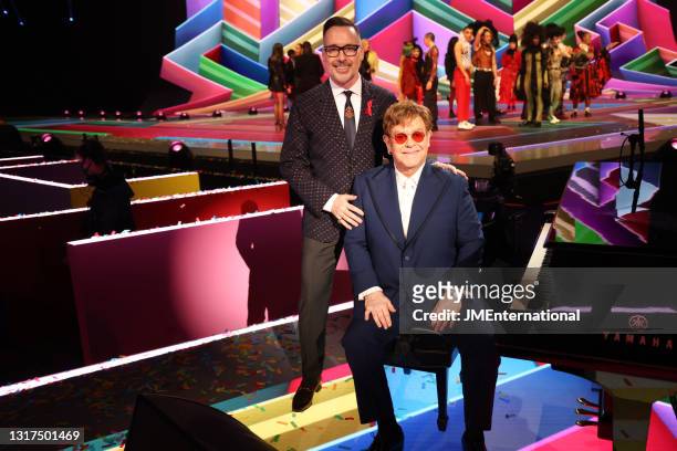 David Furnish and Sir Elton John pose during The BRIT Awards 2021 at The O2 Arena on May 11, 2021 in London, England.