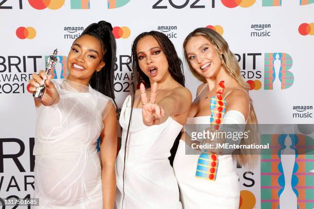 Leigh-Anne Pinnock, Jade Thirlwall and Perrie Edwards of Little Mix pose with their British Group award in the media room during The BRIT Awards 2021...