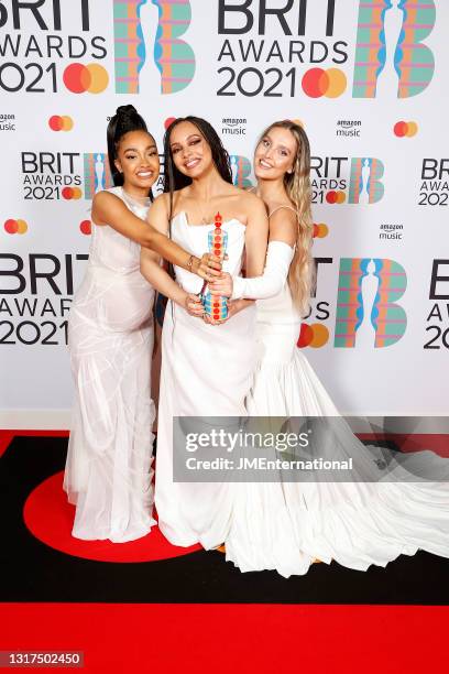 Leigh-Anne Pinnock, Jade Thirlwall and Perrie Edwards of Little Mix pose with their British Group award in the media room during The BRIT Awards 2021...