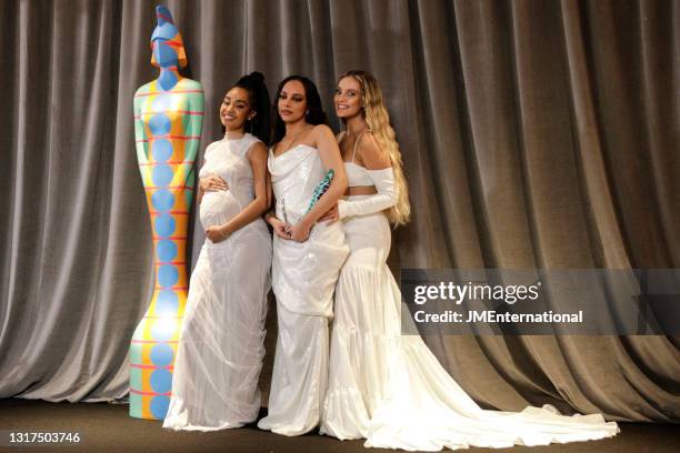 Leigh-Anne Pinnock, Jade Thirlwall and Perrie Edwards of Little Mix pose with their British Group award in the media room during The BRIT Awards 2021...