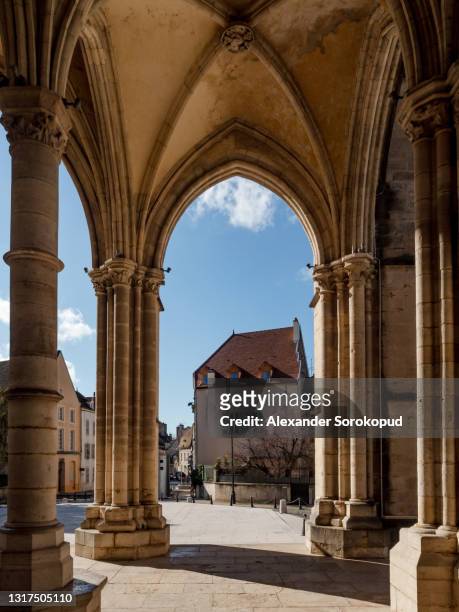the interiors of the old church of the 11th century. gothic and baroque. arches, organ, wall paintings. - beaune stock pictures, royalty-free photos & images