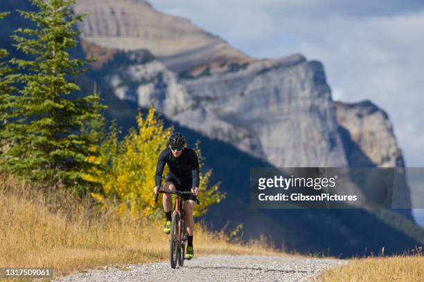 gravel road bicycle ride - white gravel stock pictures, royalty-free photos & images