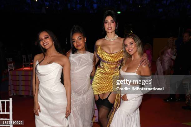 Dua Lipa poses with Jade Thirlwall , Leigh-Anne Pinnock and Perrie Edwards during The BRIT Awards 2021 at The O2 Arena on May 11, 2021 in London,...