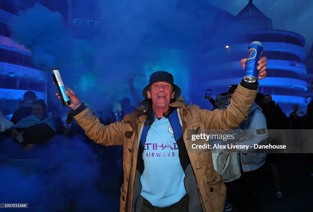 Manchester City Fans Celebrate Winning the Premier League Title