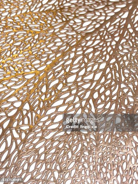 abstract pattern formed by yellow metal leaf veins - lace textile stock pictures, royalty-free photos & images