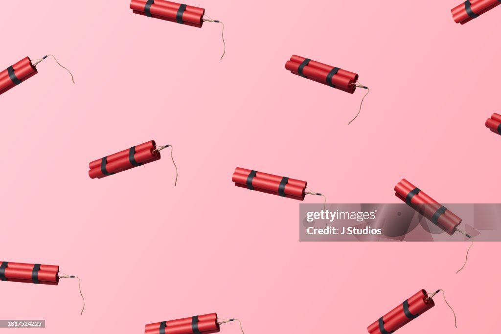 Multiple bundles of dynamite sticks floating in the air