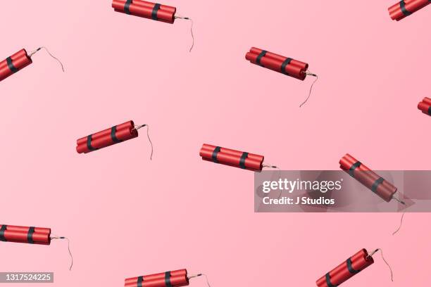 multiple bundles of dynamite sticks floating in the air - dynamite - fotografias e filmes do acervo