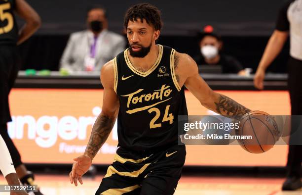 Khem Birch of the Toronto Raptors looks to pass during a game against the LA Clippers at Amalie Arena on May 11, 2021 in Tampa, Florida. NOTE TO...