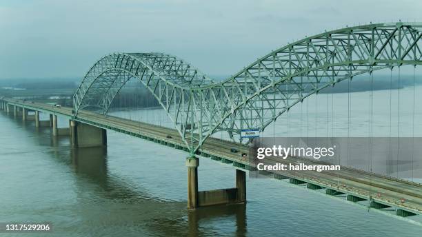 interstate 40 entering arkansas on the hernando de soto bridge - mississippi v arkansas stock pictures, royalty-free photos & images