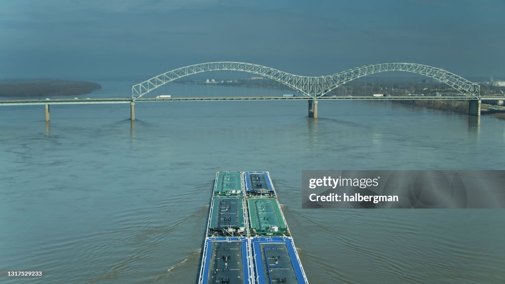 Barge Approaching Hernando de Soto Bridge on the Mississippi - Aerial