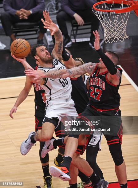 Mike James of the Brooklyn Nets shoots against Daniel Theis of the Chicago Bulls at the United Center on May 11, 2021 in Chicago, Illinois. NOTE TO...