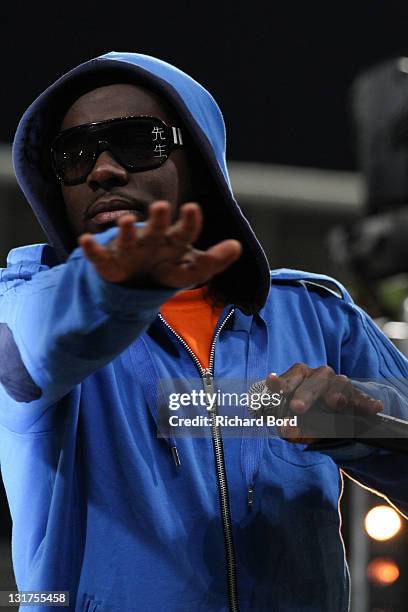 Maitre Gim's of Sexion d'Assaut rap group sings at the World Charity Soccer 2010 Charity Match for Haiti at Stade Charlety on May 19, 2010 in Paris,...