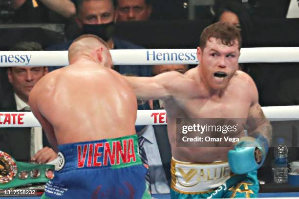 Saul Canelo Alvarez and Billy Joe Saunders fight during WBC, WBA Super, WBO and Ring Magazine World Super-Middleweight unification at AT&T Stadium on...