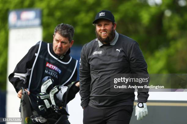 Andrew Johnston of England reacts as he walks down the twelfth during the First Round of The Betfred British Masters hosted by Danny Willett at The...