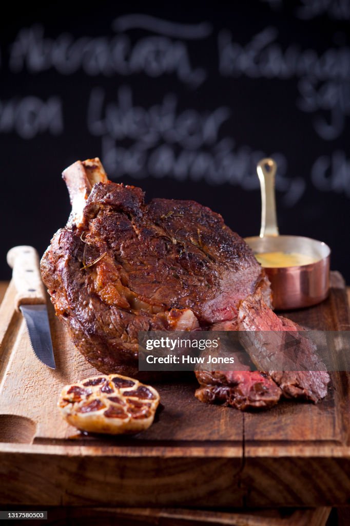 Beef Rib Eye Steak with Bearnaise Sauce in a Hotel or Restaurant Setting