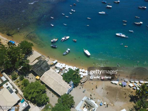 aerial view on town square and beach of praia do forte - forte beach stock pictures, royalty-free photos & images