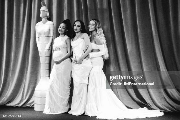 Leigh-Anne Pinnock, Jade Thirlwall and Perrie Edwards of Little Mix pose with their British Group award in the media room during The BRIT Awards 2021...