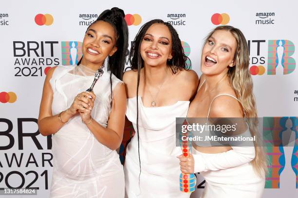 Leigh-Anne Pinnock, Jade Thirlwall and Perrie Edwards of Little Mix pose with their British Group award in the media room during The BRIT Awards 2021...