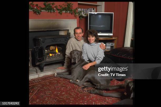 Olympic track runner Steve Ovett photographed at home with his wife Rachel, circa 1987.