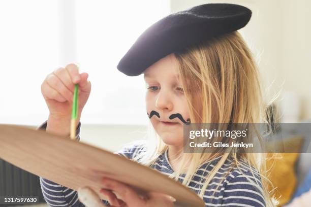 young girl playing dress up as an artist at home - painter beret stock pictures, royalty-free photos & images