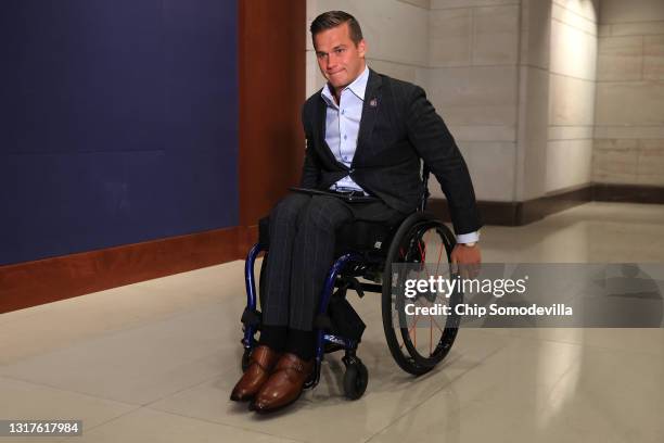 Rep. Madison Cawthorn arrives for a House Republican conference meeting in the U.S. Capitol Visitors Center on May 12, 2021 in Washington, DC. GOP...