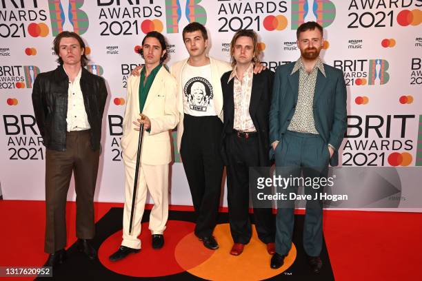 Conor Curley, Carlos O'Connell, Grian Chatten, Conor Deegan and Tom Coll of Fontaines DC attends The BRIT Awards 2021 at The O2 Arena on May 11, 2021...