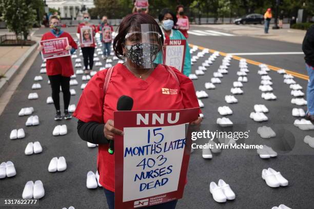 Jacqueline Brooks, a registered nurse, joins other nurses affiliated with the group National Nurses United in reading the names of registered nurses...