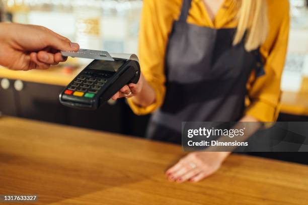 Tapping Card To Pay Photos and Premium High Res Pictures - Getty Images