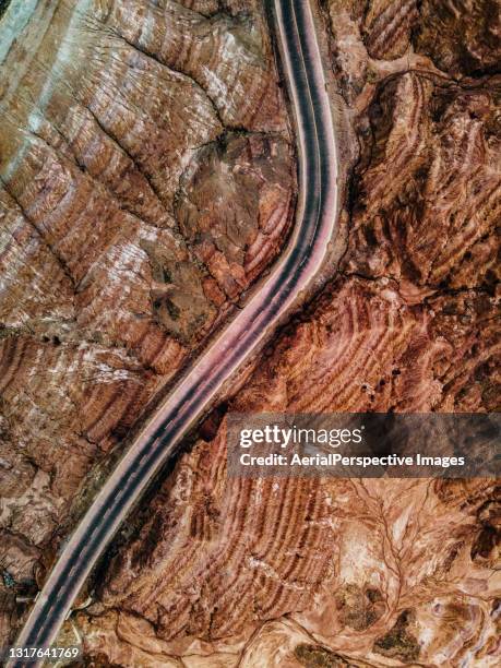 aerial view of rural road - wilderness road stock pictures, royalty-free photos & images
