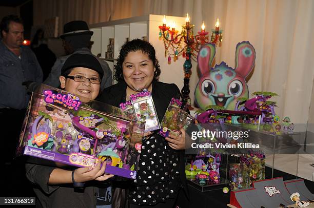 Actor Rico Rodriguez and Raini Rodriguez attend the Official AMA Backstage Boutique day 1 at LA Live on November 19, 2010 in Los Angeles, California.