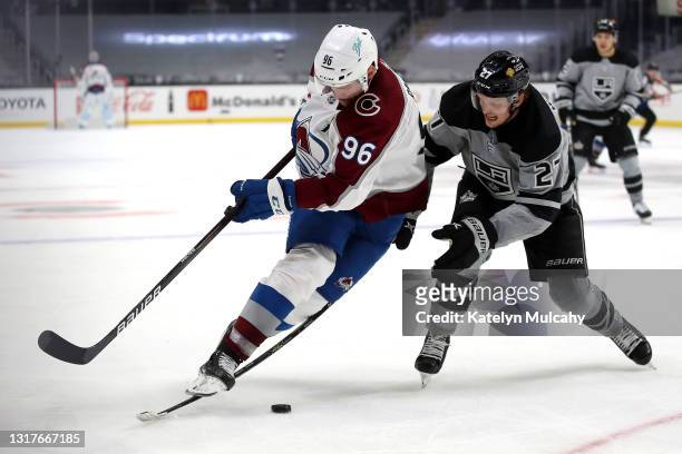 Mikko Rantanen of the Colorado Avalanche skates for the puck against Austin Wagner of the Los Angeles Kings during the third period at Staples Center...
