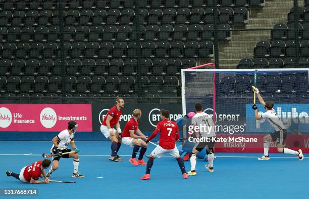 Harry Martin of Great Britain scores their team's fifth goal during the FIH Hockey Pro League match between Great Britain and Germany at Lee Valley...