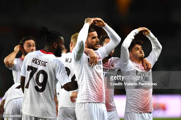 Theo Hernandez of A.C. Milan celebrates with team mates after scoring their side's first goal during the Serie A match between Torino FC and AC Milan...