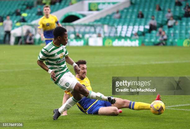 Karamoko Dembele of Celtic scores their side's fourth goal during the Scottish Premiership match between Celtic and St Johnstone on May 12, 2021 in...