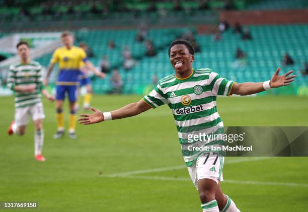 Karamoko Dembele of Celtic celebrates after scoring their side's fourth goal during the Scottish Premiership match between Celtic and St Johnstone on...