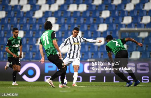 Cristiano Ronaldo of Juventus scores their side's second goal during the Serie A match between US Sassuolo and Juventus at Mapei Stadium - Città del...