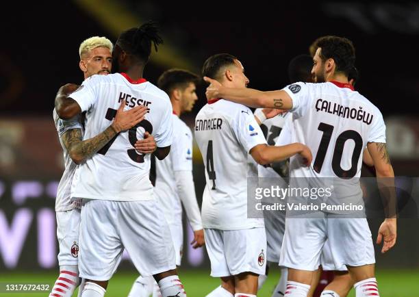 Franck Kessie of A.C. Milan celebrates with team mates after scoring their side's second goal during the Serie A match between Torino FC and AC Milan...